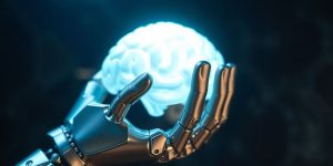 Robotic hand holding a glowing brain